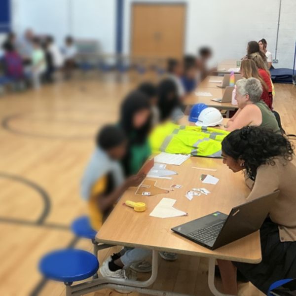 Rohan Short attends Year 6 careers event at Hannah More Primary School
